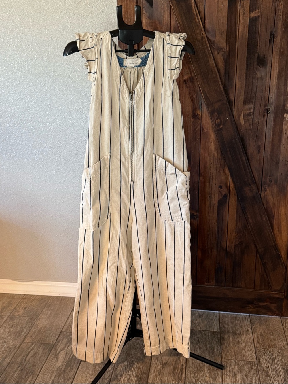 Anthropologie Cream Jumpsuit with Navy Pinstripes and Ruffle Sleeves